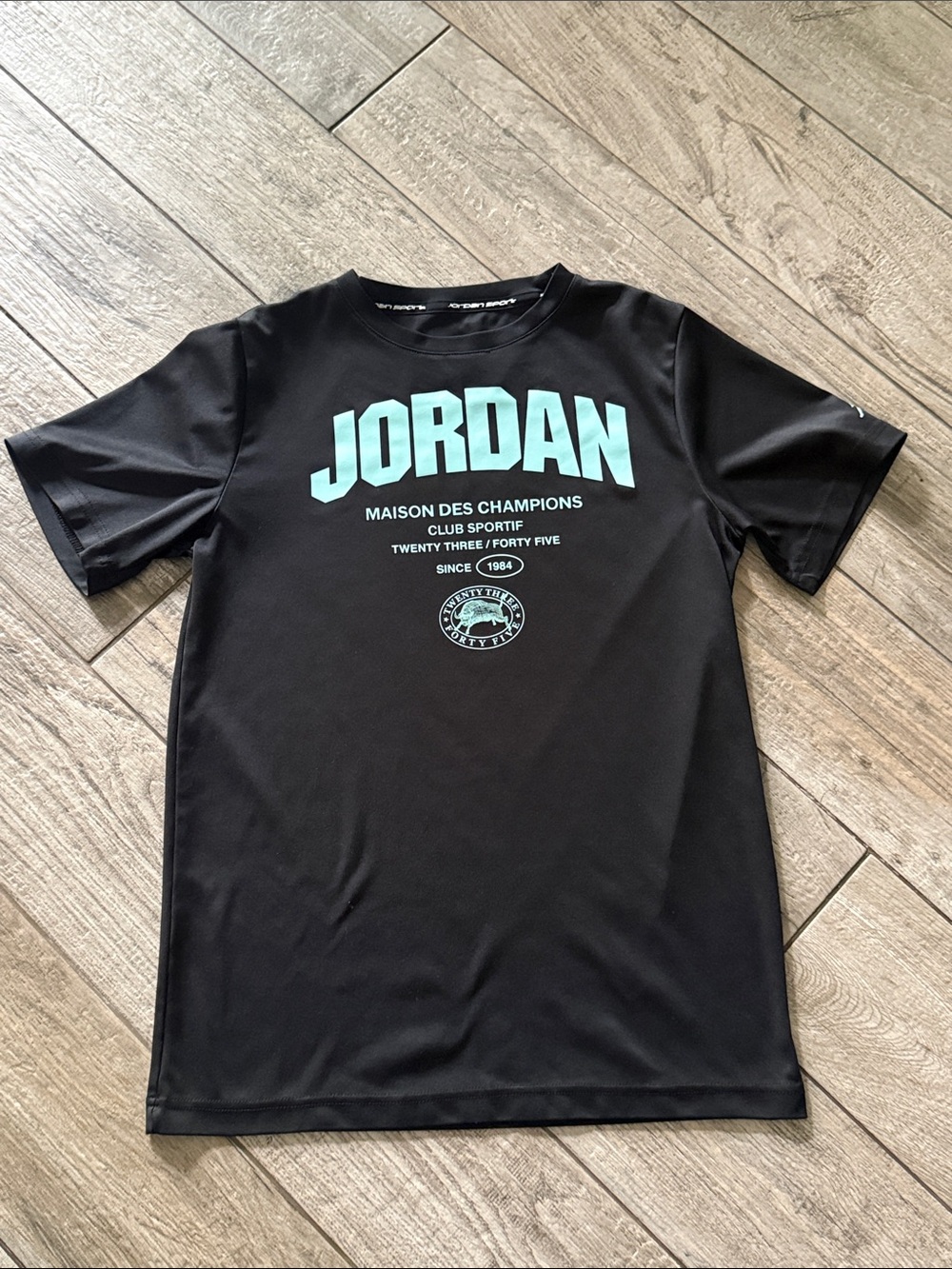 EUC Air Jordan Black Short-Sleeve Tee with blue Graphic